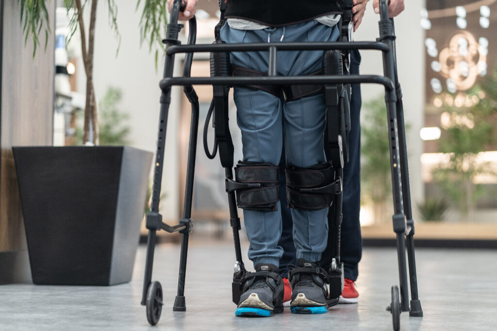 Patient with Exoskeleton
